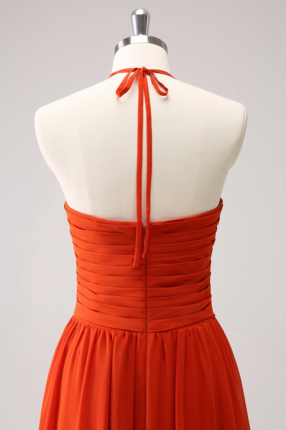 Pomarańczowa długa sukienka druhny o linii A z marszczeniami