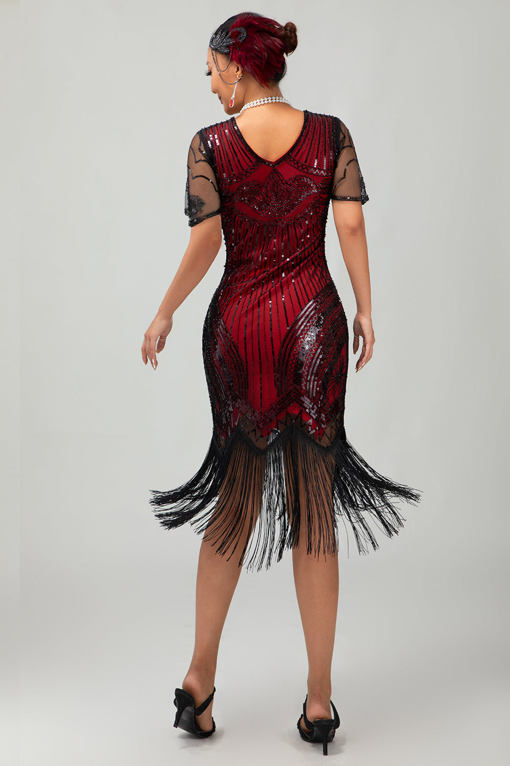 złota cekinowa sukienka bodycon z lat 1920. z frędzlami