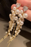 Długie kolczyki Golden Pearl