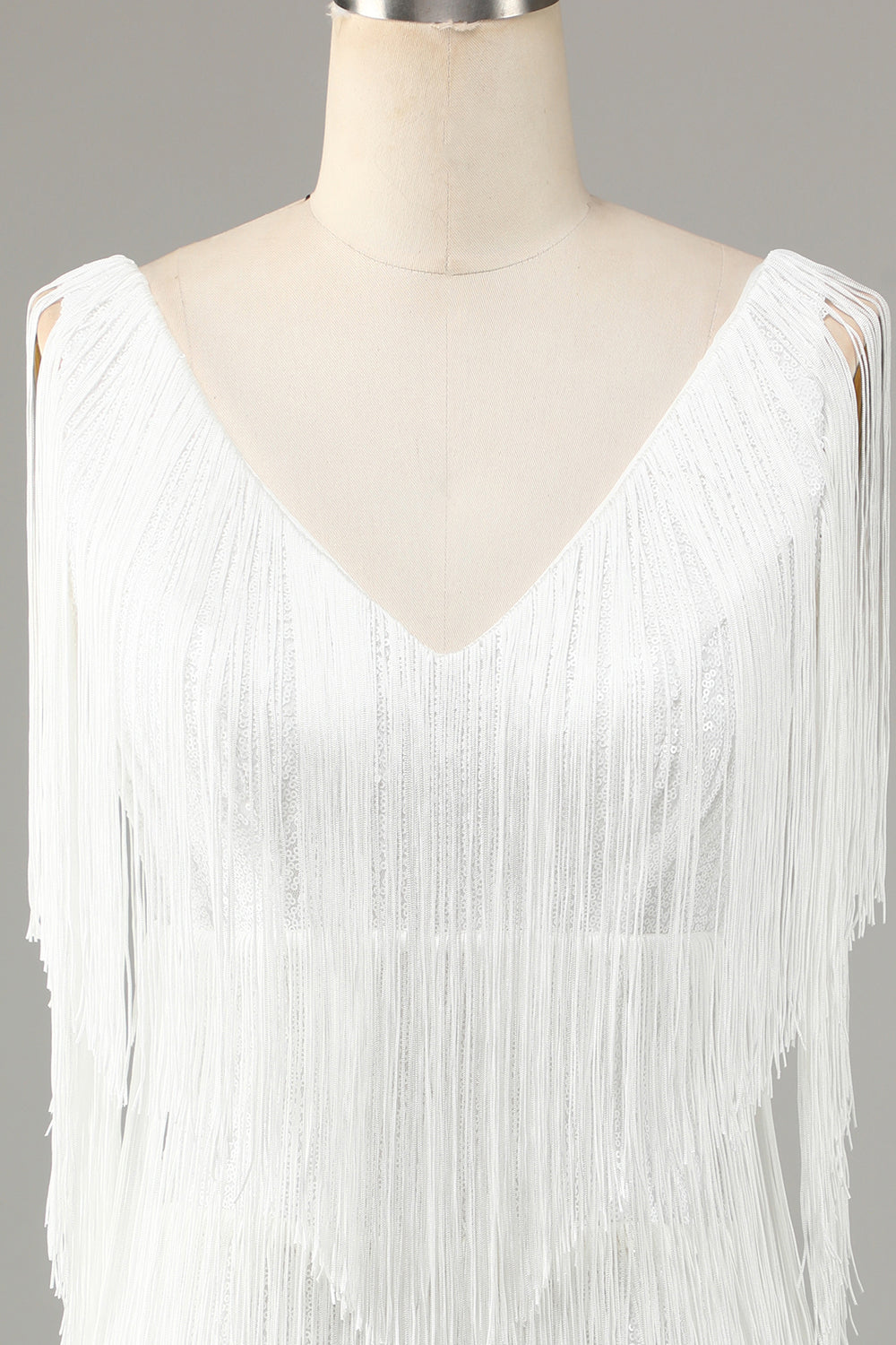 Ładna sukienka z dekoltem w serek z krzyżem mini z frędzlami