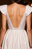 Błyszczący gorset w kolorze kości słoniowej A line Cap Sleeves Homecoming Dress