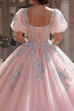 Różowa suknia balowa z aplikacjami na gorset Quinceanera z puszystymi rękawami