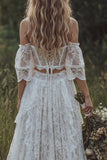 Korset z koronką z odsłoniętych ramion w kolorze kości słoniowej – suknia ślubna Boho