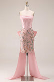 Różowa, dopasowana sukienka na bal z kwiatowym gorsetem bez ramiączek z kokardą