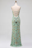 Długa sukienka na bal z zielonymi koralikami i ramiączkami spaghetti z koronką