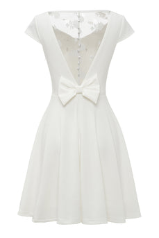 Biała koronkowa sukienka vintage