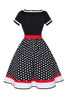 Załaduj obraz do przeglądarki galerii, Czarna sukienka w grosze z dekoltem w serek 1950s