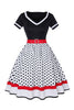 Załaduj obraz do przeglądarki galerii, Czarna sukienka w grosze z dekoltem w serek 1950s