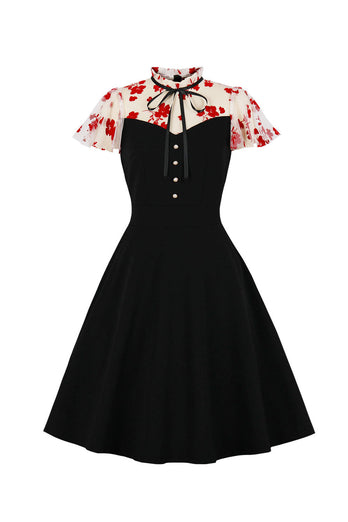 Czarna sukienka z nadrukiem Vintage z 1950 roku