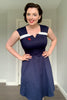 Załaduj obraz do przeglądarki galerii, Granatowa Sukienka z Asymetrycznym Dekoltem w stylu lat 50-tych