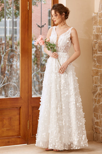 Białe aplikacje Tiulowa suknia ślubna