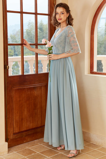 Niebieska długa szyfonowa suknia druhny z rękawami