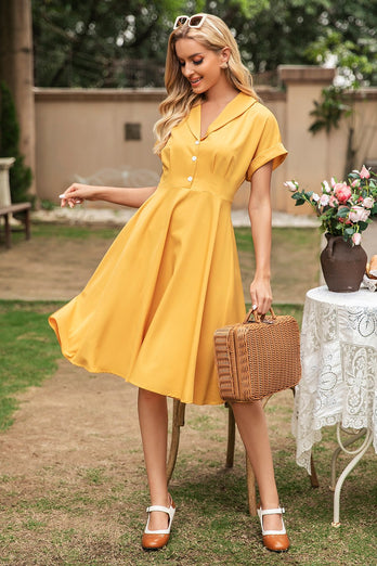 Elegancka żółta sukienka vintage z dekoltem w serek