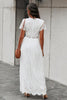 Załaduj obraz do przeglądarki galerii, Długa biała koronkowa sukienka z dekoltem w serek