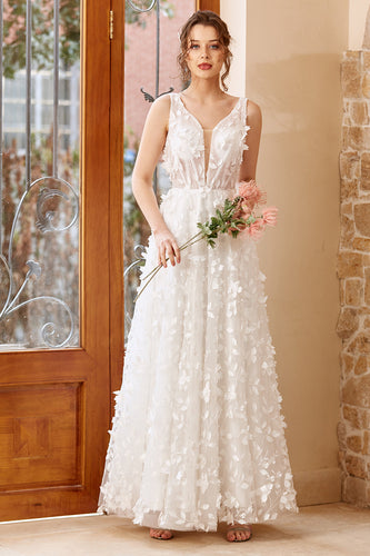 Białe aplikacje Tiulowa suknia ślubna
