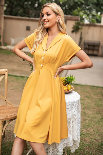 Elegancka żółta sukienka vintage z dekoltem w serek